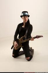 claudia-steampunk-playing-guitar-various-poses