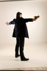 Man Old Average White Fighting with gun Standing poses Coat