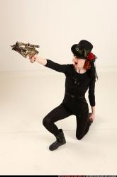 victoria-steampunk-kneeling-crossbow-pistols-aiming