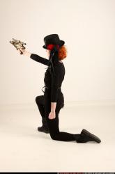 victoria-steampunk-kneeling-crossbow-pistols-aiming