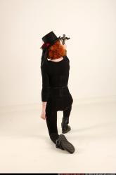 victoria-steampunk-kneeling-crossbow-pistols-aiming