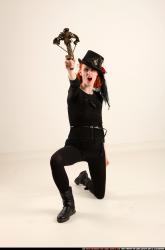 victoria-steampunk-kneeling-crossbow-pistols-aiming