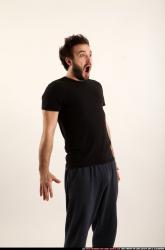 Man Adult Athletic White Facial expressions Standing poses Casual