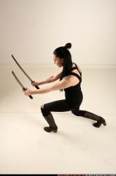 Woman Adult Athletic White Fighting with sword Standing poses Casual