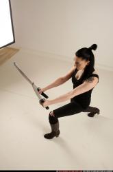 Woman Adult Athletic White Fighting with sword Standing poses Casual