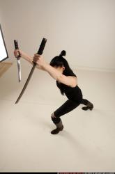 Woman Adult Athletic White Fighting with sword Standing poses Casual