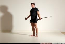 Man Adult Muscular White Fighting with sword Moving poses Sportswear