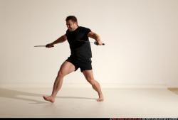 Man Adult Muscular White Fighting with sword Moving poses Sportswear