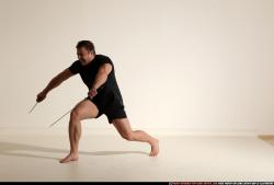 Man Adult Muscular White Fighting with sword Moving poses Sportswear