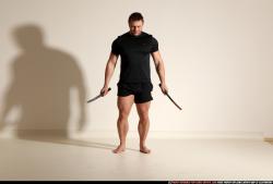 Man Adult Muscular White Fighting with sword Moving poses Sportswear