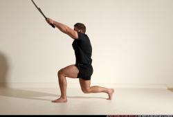 Man Adult Muscular White Fighting with sword Moving poses Sportswear