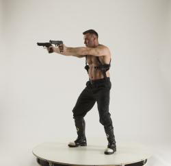 Man Adult Muscular White Fighting with gun Standing poses Pants