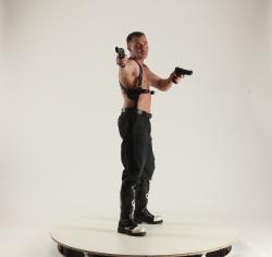 Man Adult Muscular White Fighting with gun Standing poses Pants