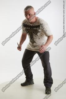 Fighting man with knife Yury