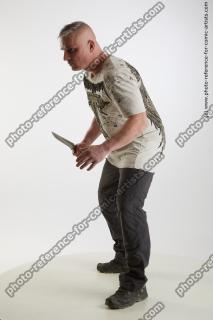 man fighting with knife yury 02