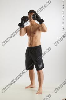 standing man with box gloves yoshinaga kuri 01