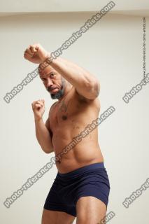 punching strong man ron 80