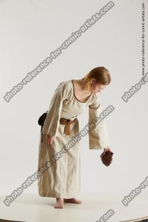 Medieval village woman poses Vinga