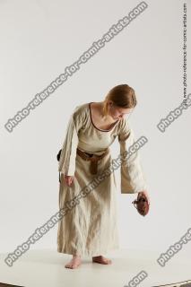 Medieval village woman poses Vinga