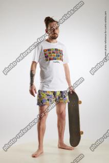 standing man with skateboard nigel 08