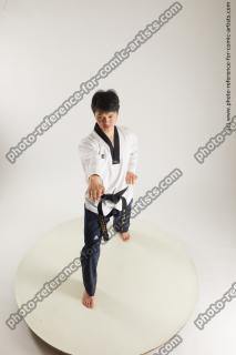 asian man taekwondo poses lan 01a