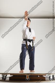 asian man taekwondo poses lan 01c
