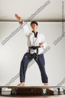 asian man taekwondo poses lan 02c