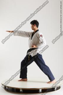 asian man taekwondo poses lan 05b