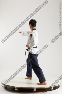 asian man taekwondo poses lan 07b