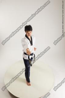 asian man taekwondo poses lan 16a