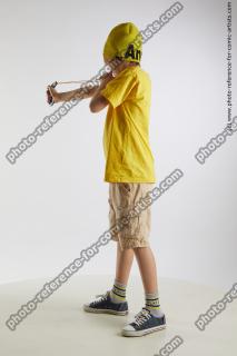 Standing boy with slingshot Novel