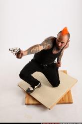 Edgar Kneeling Revolver Shooting