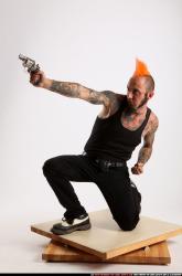 Edgar Kneeling Revolver Shooting