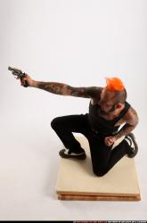 Edgar Kneeling Revolver Shooting