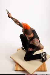 Edgar Kneeling Revolver Shooting