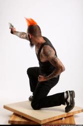 Edgar Kneeling Revolver Shooting