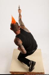 Edgar Kneeling Revolver Shooting