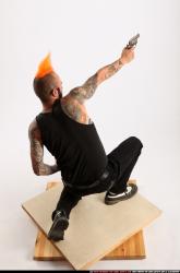 Edgar Kneeling Revolver Shooting