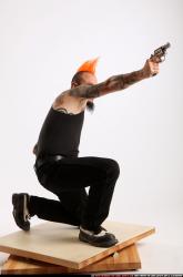 Edgar Kneeling Revolver Shooting