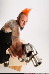 Edgar Kneeling Revolver Shooting