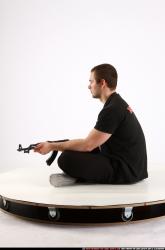 Alex Sitting With Ak-47 Rifle