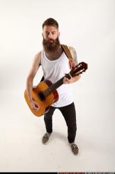 Oscar Playing Guitar