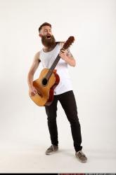 Oscar Playing Guitar