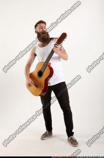 Oscar Playing Guitar