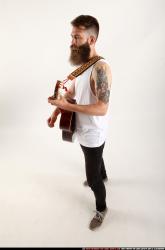 Oscar Playing Guitar