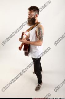 Oscar Playing Guitar