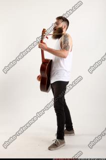 Oscar Playing Guitar