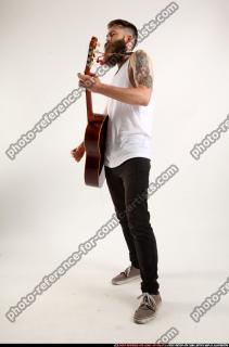 OSCAR PLAYING GUITAR 01 C