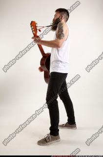 Oscar Playing Guitar