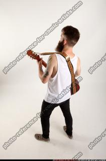 Oscar Playing Guitar